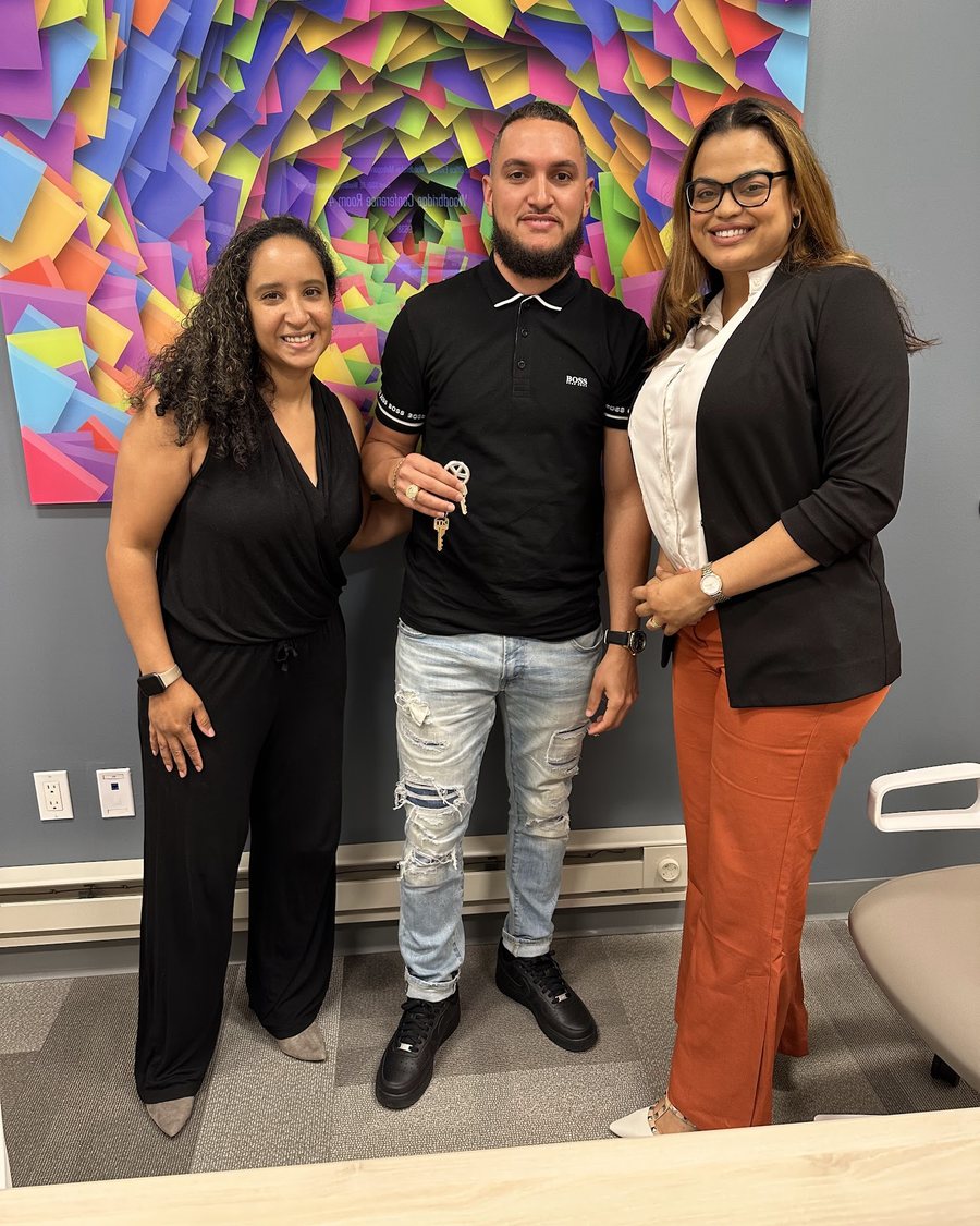 Cindy with her clients on closing day